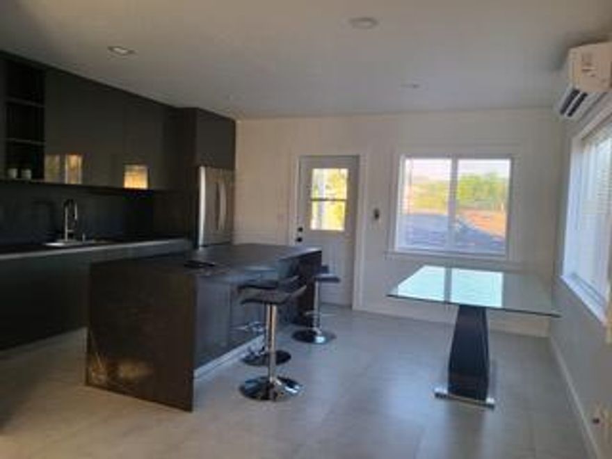 Beautifully remodeled 1 bedroom 1 bath apartment in East Lantana close to everything. Electric and water included in rent.