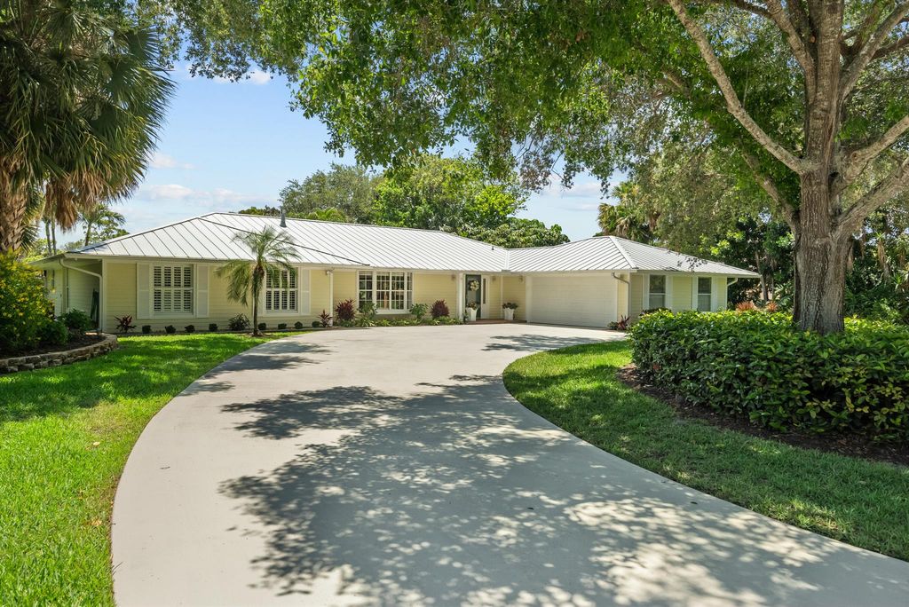 Photo of 5270 SE Burning Tree Circle, Stuart, FL 34997 (MLS # R10958217)