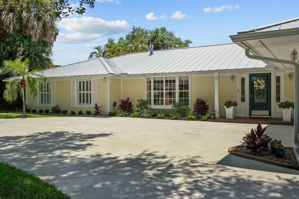 Photo of 5270 SE Burning Tree Circle, Stuart, FL 34997 (MLS # R10958217)