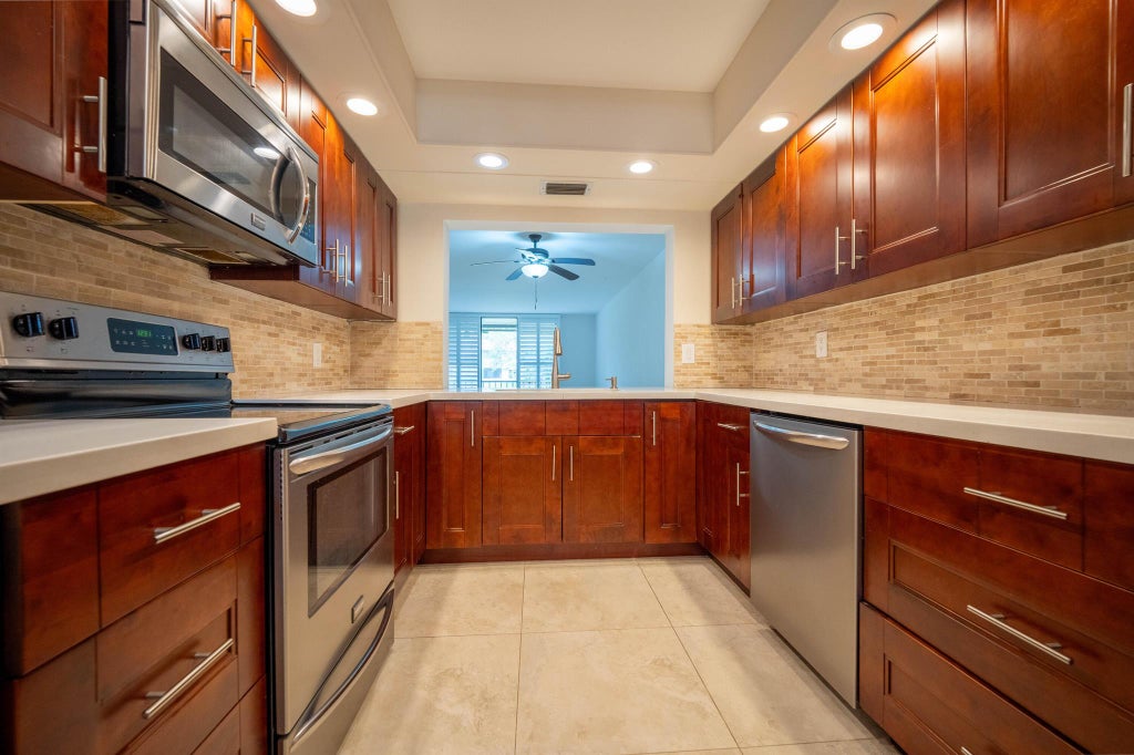 Photo of 1850 Homewood Boulevard #114, Delray Beach, FL 33445 (MLS # R10942639)