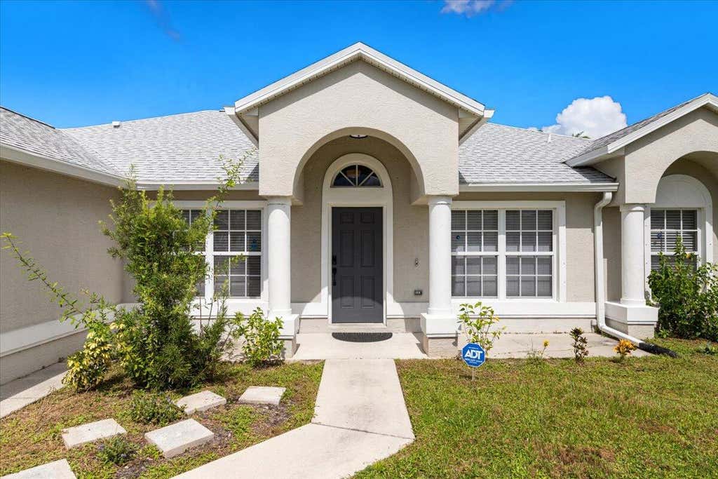 Photo of 241 SW Starfish Avenue, Port Saint Lucie, FL 34984 (MLS # R11025756)