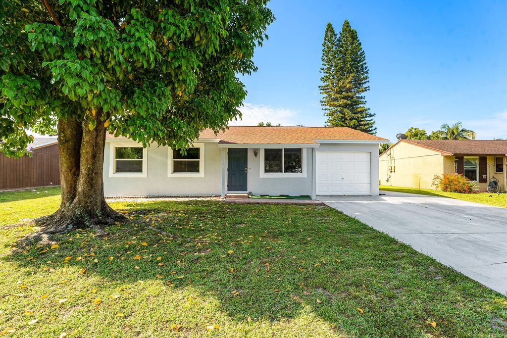 Photo of 4714 Wadita Ka Way, West Palm Beach, FL 33417 (MLS # B26022999)