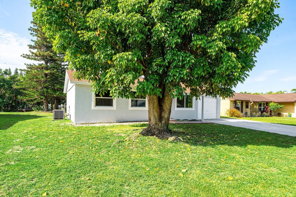 Photo of 4714 Wadita Ka Way, West Palm Beach, FL 33417 (MLS # B26022999)