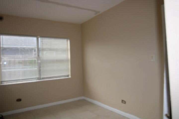Photo of 1417 W 32nd Street, Riviera Beach, FL 33404 (MLS # B26036907)