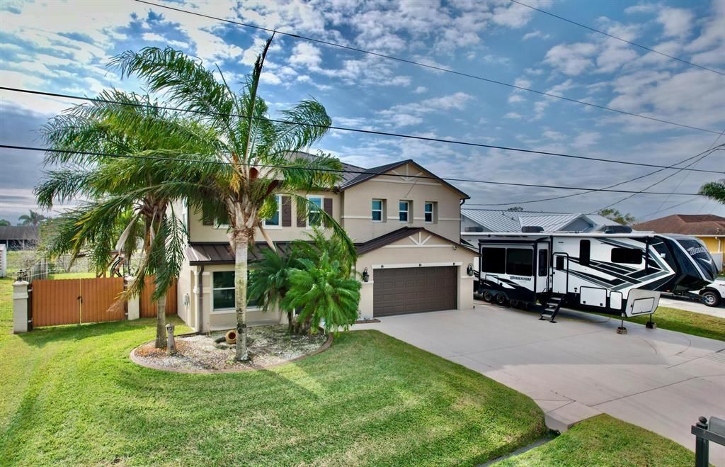 Photo of 410 SW Jeanne Avenue, Port Saint Lucie, FL 34953 (MLS # R10860002)