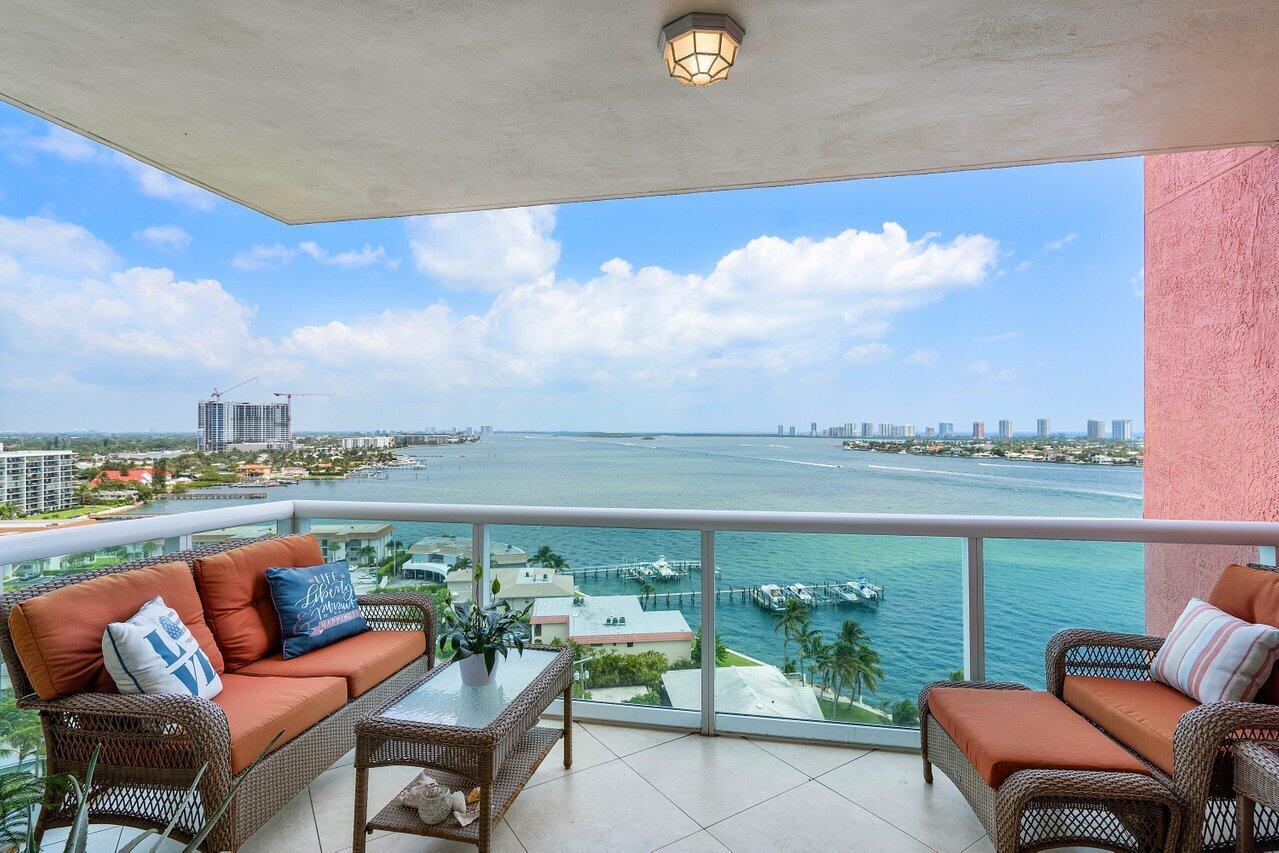 Available Nov/Dec 2025! Beautifully updated 14th floor END UNIT w/2BR + den, 2BA overlooking the Intracoastal, impact glass, semi-private elevator access. Open concept, split floor plan with spacious owners suite w/his & her walk-in closets. Amazing primary bathroom with large walk in shower, glass enclosure, modern finishes with a spa like feel! New Doors throughout, neutral paint and fully tiled. plantation shutters and a new A/C unit! Assigned garage parking & climate-controlled storage unit. 24/7 manned gate, valet, NEW tennis/pickleball, walking path w/gazebo, Newly renovated rooftop oasis w/pool, spa, BBQ areas, clubhouse, billiard room & fitness center. Marina w/dry docks available. Boaters - easy ocean access in minutes; no fixed bridges! Pet friendly and social community.