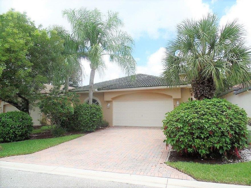 Located in the Sorrento section of Venetian Isles, a well-established gated community in West Boynton Beach where it's residents enjoy an active lifestyle with one of a kind amenities that include a clubhouse, resort style pool, sauna, tennis courts, theater, ballroom, fitness center, billiards, card rooms, library and many clubs and actives. This 3/2 single family home is complete with a 2CG, a light, bright and airy open concept floor plan with feature windows, arch doorways, tiled living areas and vaulted ceilings. Sliding glass doors lead from the kitchen to the screened and covered patio. Private and perfect for entertaining or relaxing. Main bath features a roman tub, double sink & vanities and a separate shower. Conveniently located within a few miles radius from fine dining, shops galore, the FL turnpike, Bethesda Health City, 12 miles to the Wellington mall as well as to the finest beaches South FL has to offer!!  A MUST see!!!
