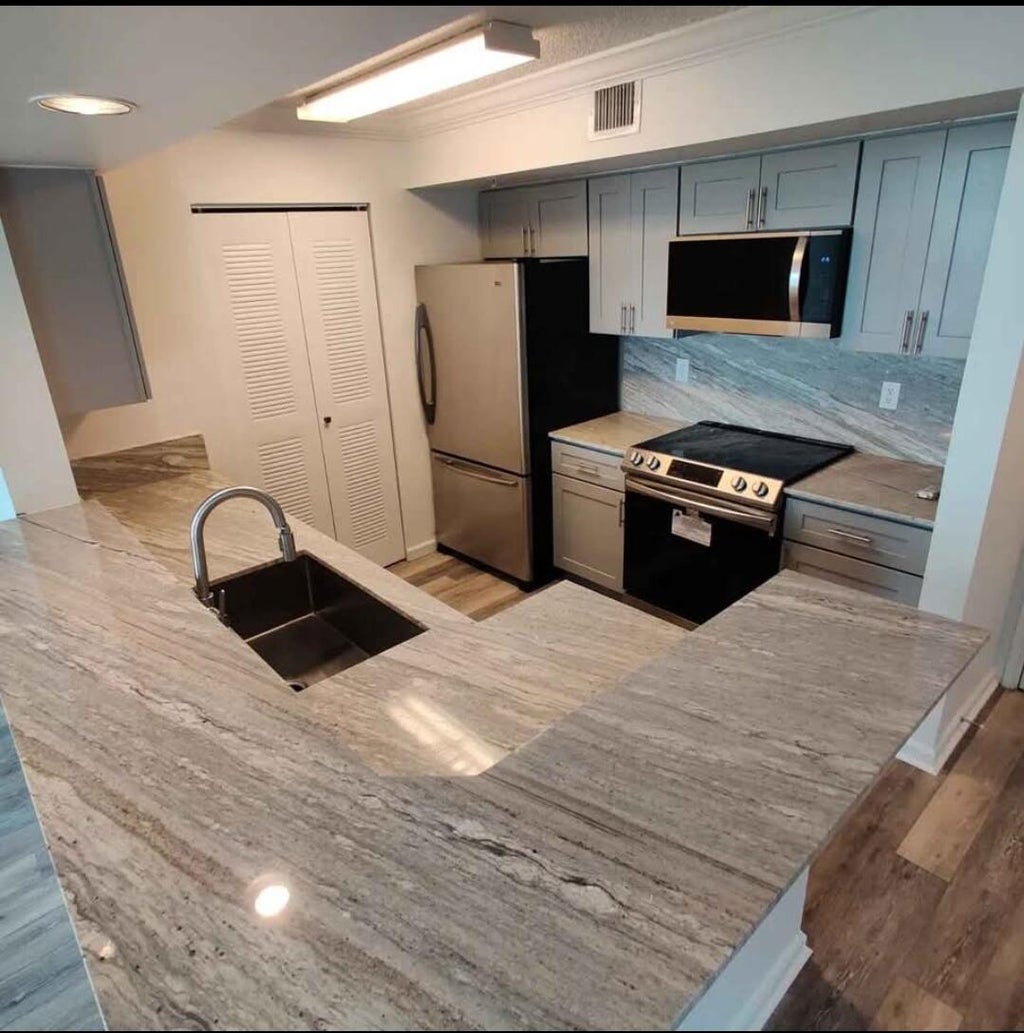Photo of 1000 Scotia Drive #506, Hypoluxo, FL 33462 (MLS # B26038773)