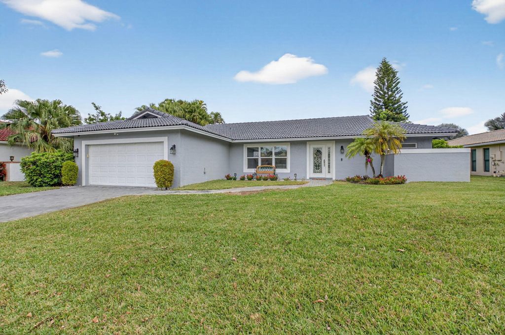 Photo of 10302 Crosswind Road, Boca Raton, FL 33498 (MLS # R11167846)