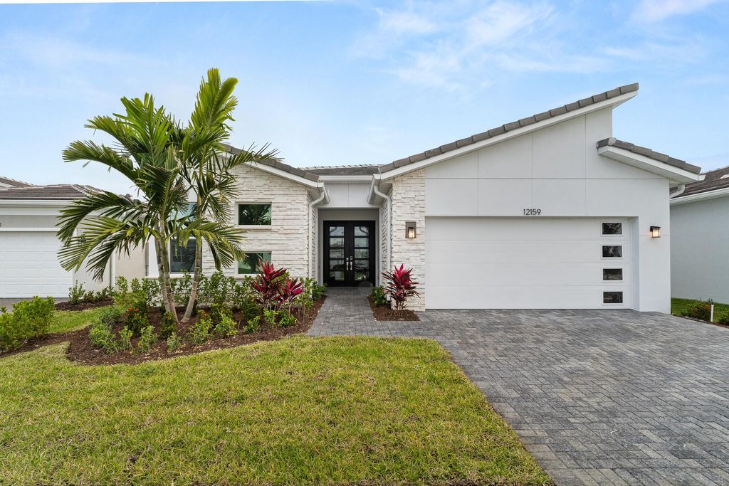 Photo of 12159 SW Ameresque Way, Port Saint Lucie, FL 34987 (MLS # R11081489)