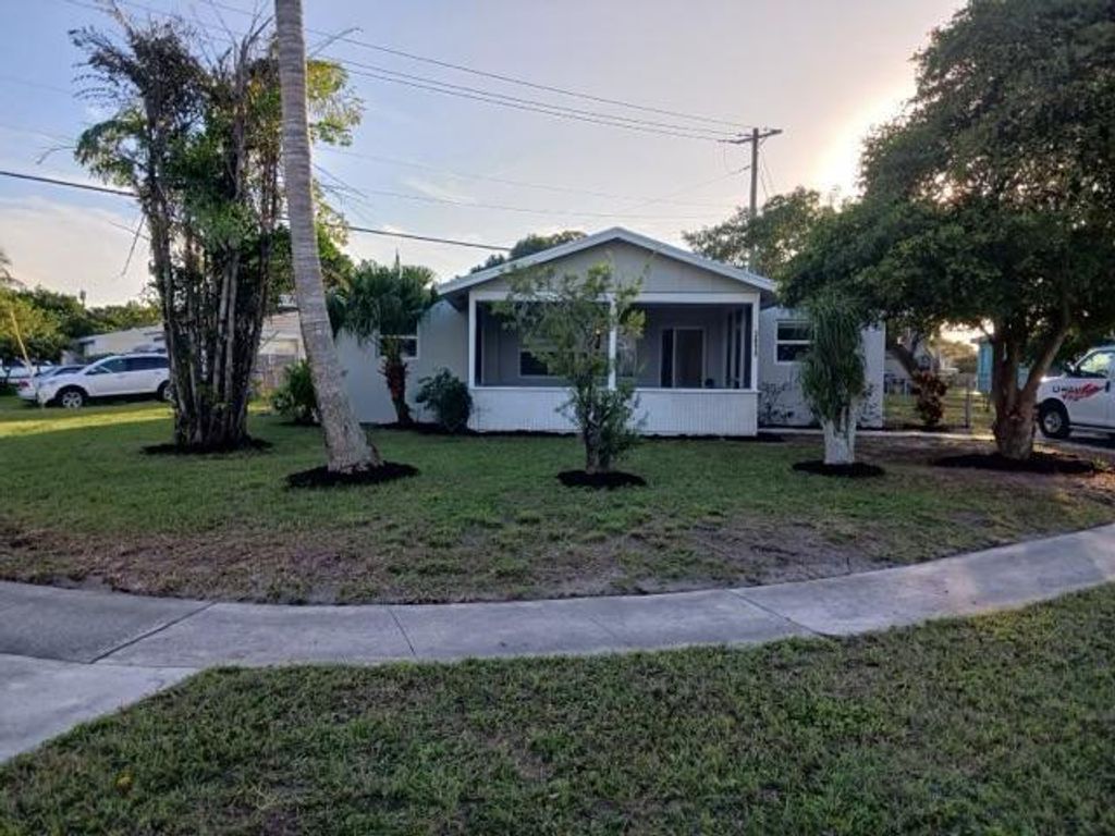 Photo of 3696 Tallulah Road, Lake Worth, FL 33462 (MLS # R10940023)