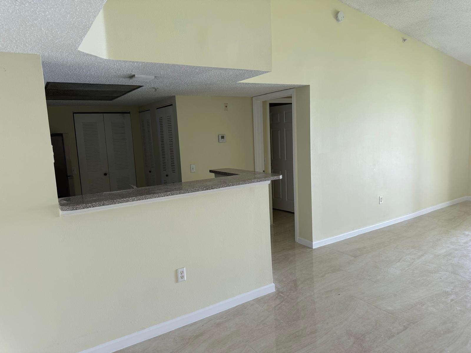 Welcome to this stunning Lakeview corner unit on the second floor—featuring soaring vaulted ceilings and a spacious 2-bed, 2-bath split floor plan. Freshly painted. With new porcelain and tile flooring throughout, a separate laundry area with full-size, newer washer/dryer, and a master bedroom with a walk-in closet, this home blends style and practicality. Every room showcases breathtaking lake views, creating a serene retreat.
Located in a gated community with all amenities, it’s ideally situated near Coconut Creek schools, major highways, the Promenade, and Coconut Creek Casino. Professionally managed for hassle-free living.