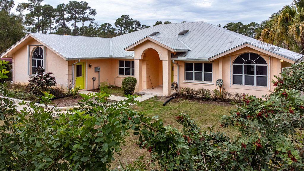 Photo of 5702 SW Mistletoe Lane, Palm City, FL 34990 (MLS # R10774859)