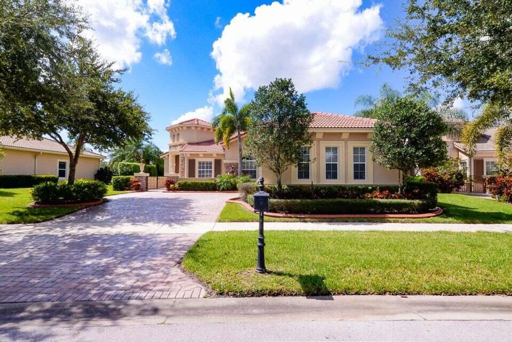 Photo of 9895 SW Nuova Way, Port Saint Lucie, FL 34986 (MLS # R11063028)