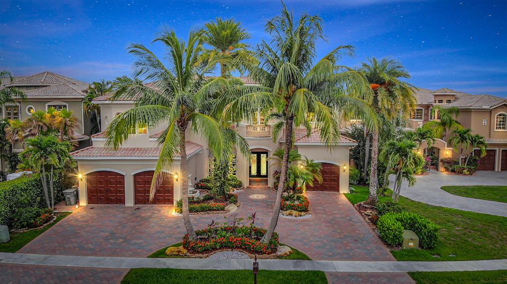 Elegance and sophistication meet at this magnificent transitional estate situated on an oversized cul de sac lake lot in the Oaks at Boca Raton. Incredible long lake views from the palatial windows. Featuring 6 bedrooms plus an office plus a professional media room that boasts 11 seats. This home must be seen to be appreciated. Marble floors, custom window treatments, light fixtures, built ins, a whole house generator, circular driveway, custom iron front doors and more. The oversized pool spa and waterfall create a tropical paradise with room for a basketball court and room to play and entertain outdoors. Live the ultimate South Florida lifestyle with the covered patio, walk out balcony from the Master and Loft. Walk to the clubhouse which features exclusive country club style living.
