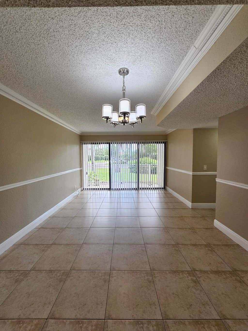Photo of 1440 WINDORAH Way #B, West Palm Beach, FL 33411 (MLS # B26060240)