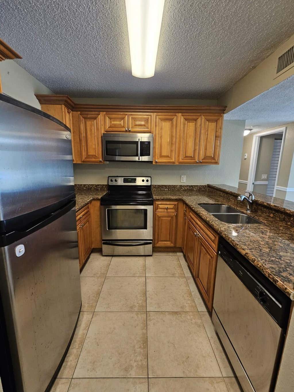 Photo of 1440 WINDORAH Way #B, West Palm Beach, FL 33411 (MLS # B26060240)