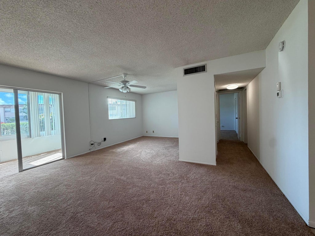 Photo of 702 Lori Drive #185, Palm Springs, FL 33461 (MLS # B26090577)