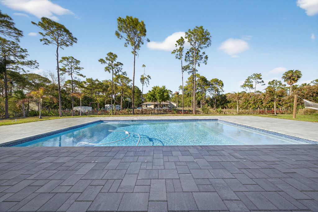 Photo of 12683 67th Street N, West Palm Beach, FL 33412 (MLS # B26003180)