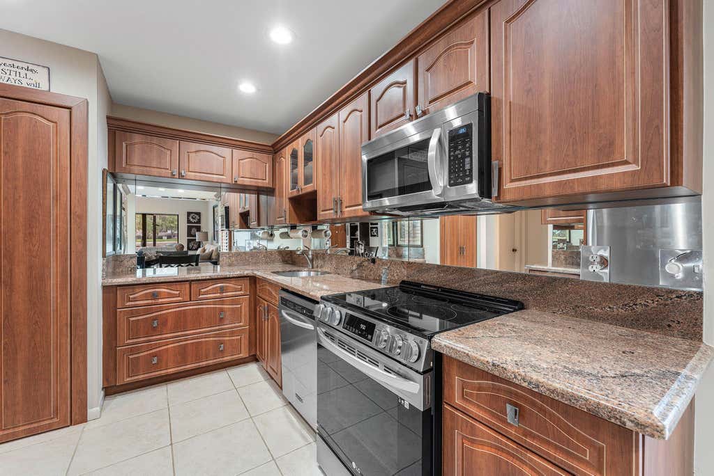 Photo of 1 Stratford Drive E #D, Boynton Beach, FL 33436 (MLS # B26053676)