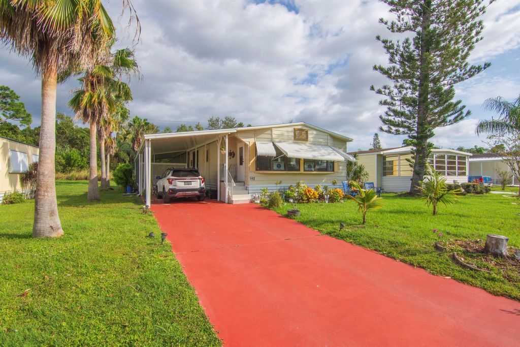 Photo of 192 W Caribbean, Port Saint Lucie, FL 34952 (MLS # R11128075)