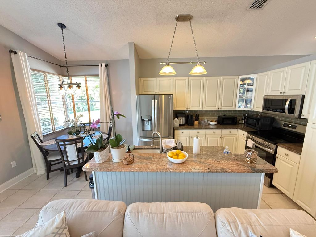 Photo of 7841 Rockport Circle, Lake Worth, FL 33467 (MLS # B26006000)