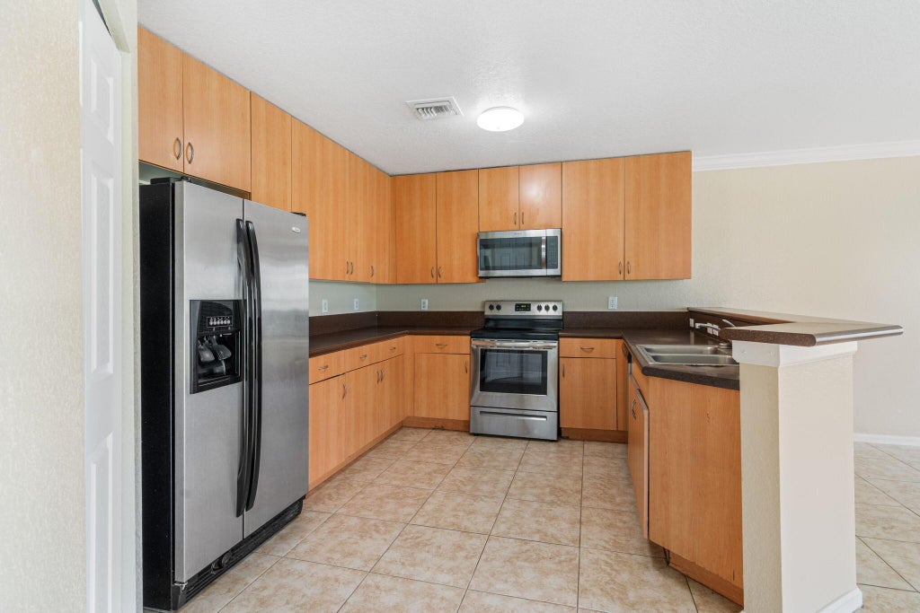 Photo of 6355 Adriatic Way, West Palm Beach, FL 33413 (MLS # R11083330)
