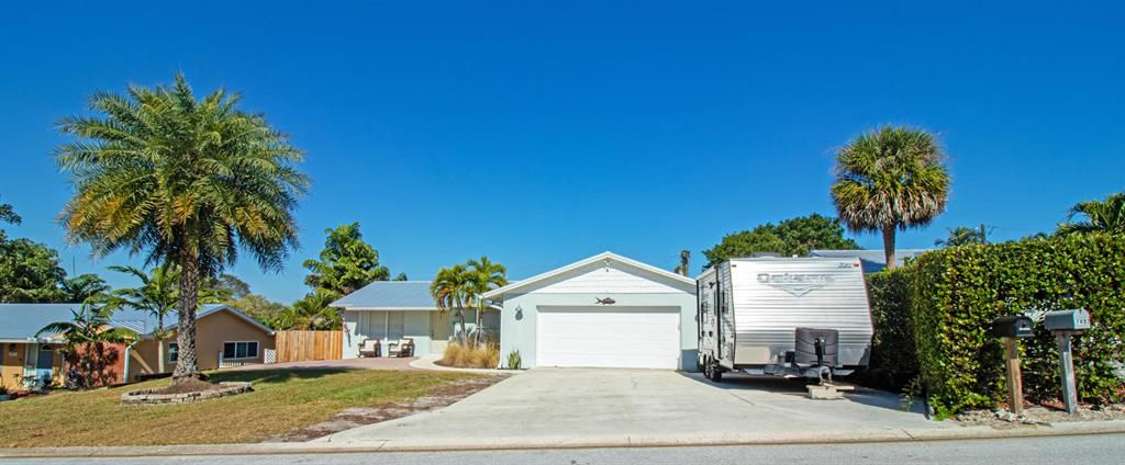 Photo of 7491 SE Sandpiper Street, Hobe Sound, FL 33455 (MLS # R10869597)