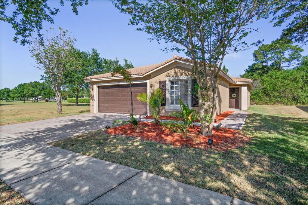 Photo of 1975 SW Newport Isles Boulevard, Port Saint Lucie, FL 34953 (MLS # R10981133)