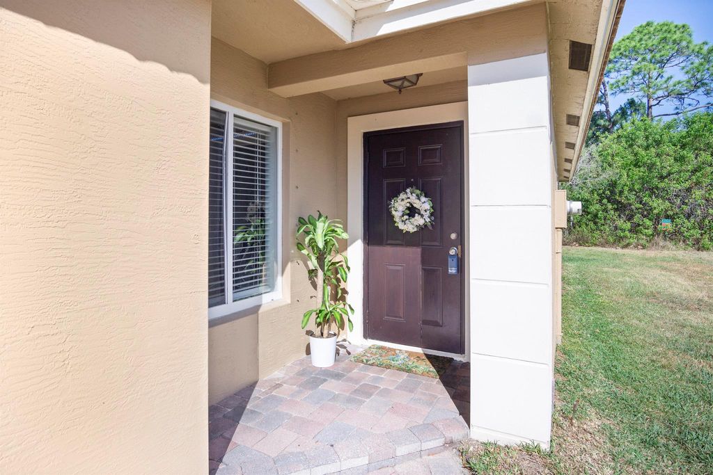 Photo of 1975 SW Newport Isles Boulevard, Port Saint Lucie, FL 34953 (MLS # R10981133)
