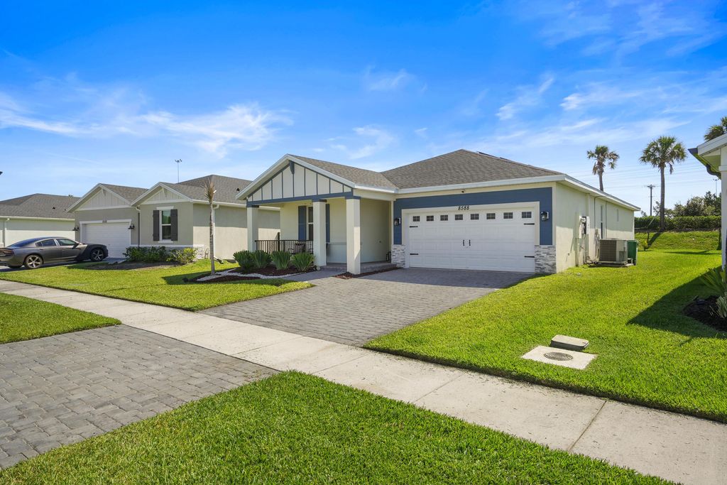 Photo of 8588 Dahlia Circle, Port Saint Lucie, FL 34986 (MLS # B26027655)