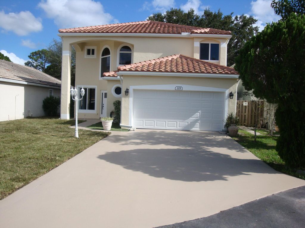 Photo of 225 Maplewood Lane, Greenacres, FL 33463 (MLS # R11133051)
