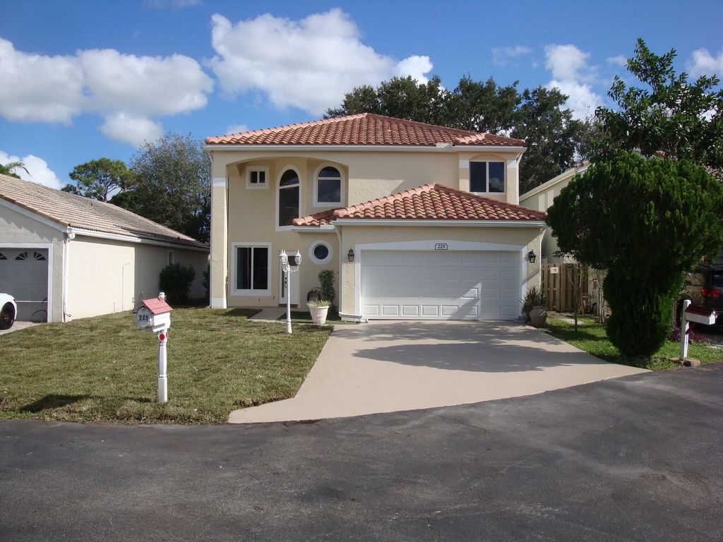 Photo of 225 Maplewood Lane, Greenacres, FL 33463 (MLS # R11133051)