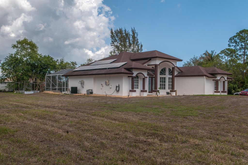 Photo of 16595 93rd Rd N, The Acreage, FL 33470 (MLS # B26000499)