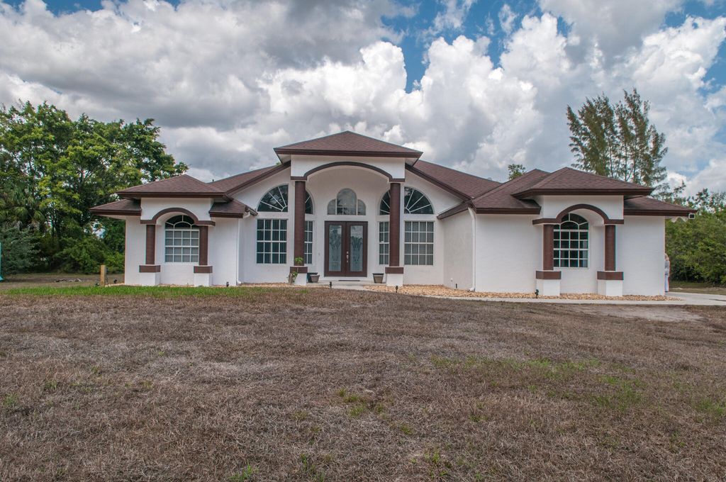 Photo of 16595 93rd Rd N, The Acreage, FL 33470 (MLS # B26000499)