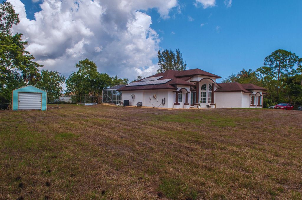 Photo of 16595 93rd Rd N, The Acreage, FL 33470 (MLS # B26000499)