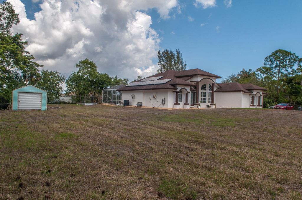 Photo of 16595 93rd Rd N, The Acreage, FL 33470 (MLS # B26000499)
