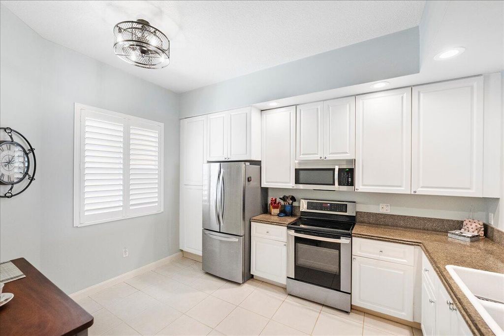 Photo of 18 Harbour Isle Drive W #102, Fort Pierce, FL 34949 (MLS # R11168655)