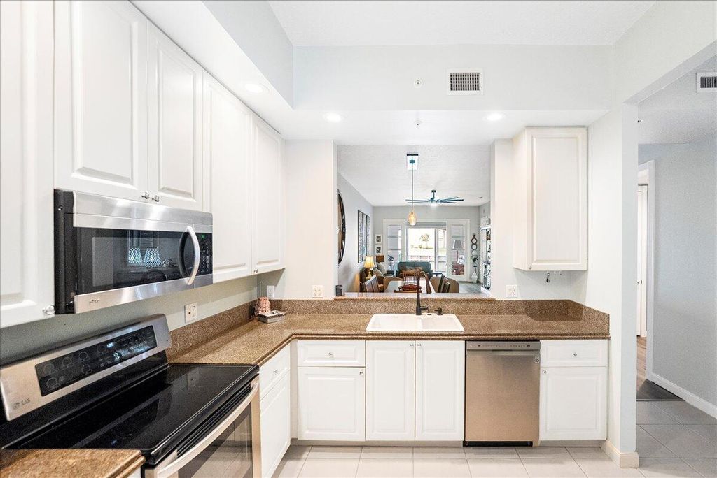 Photo of 18 Harbour Isle Drive W #102, Fort Pierce, FL 34949 (MLS # R11168655)