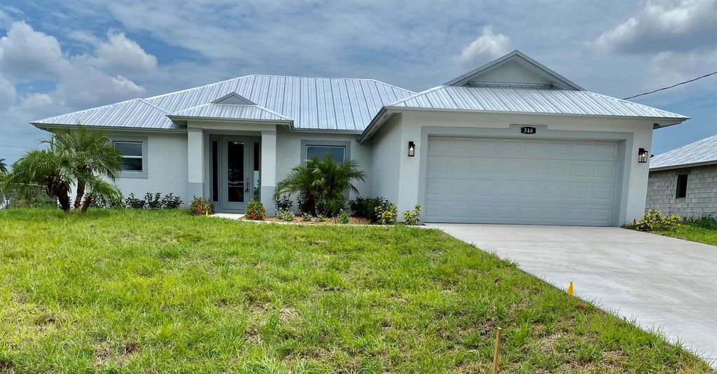 Photo of 346 SW Ridgecrest Drive, Port St Lucie, FL 34953 (MLS # R10901625)