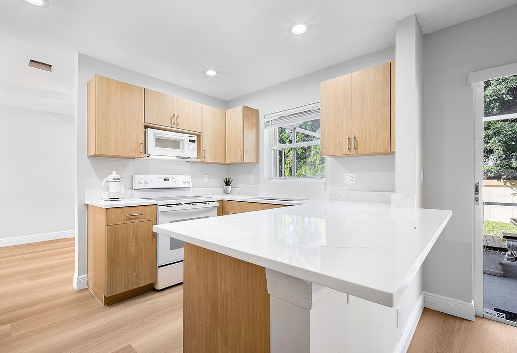 Photo of 4292 NW 1st Place, Deerfield Beach, FL 33442 (MLS # F10443799)