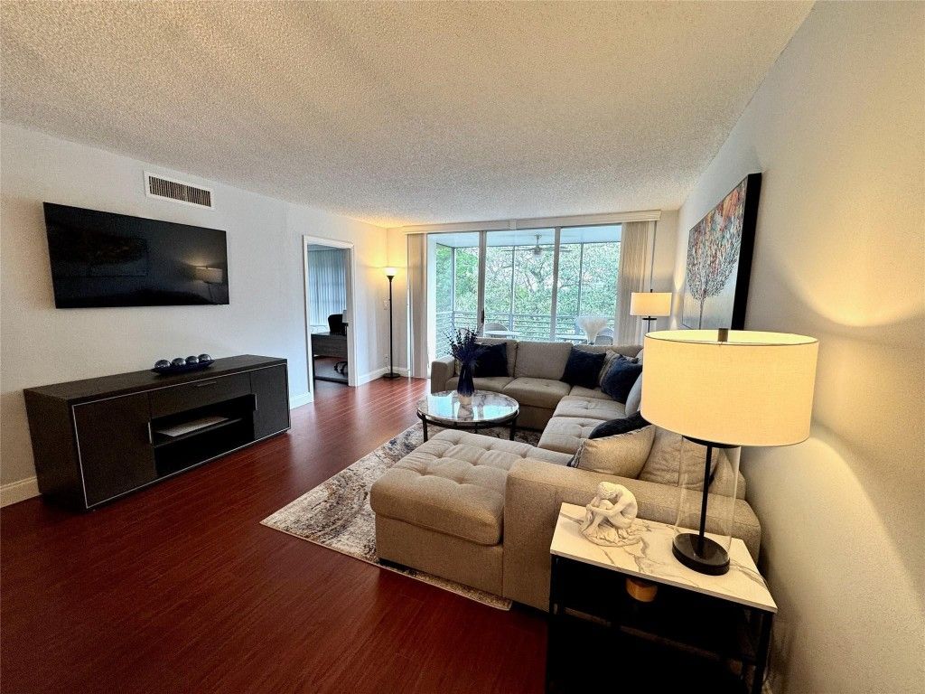 Photo of 3850 Oaks Clubhouse Drive #506, Pompano Beach, FL 33069 (MLS # F10490416)