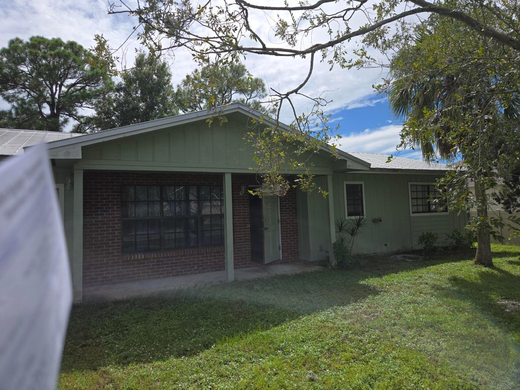 Photo of 761 NW BAYSHORE Boulevard, Port Saint Lucie, FL 34983 (MLS # B26078697)