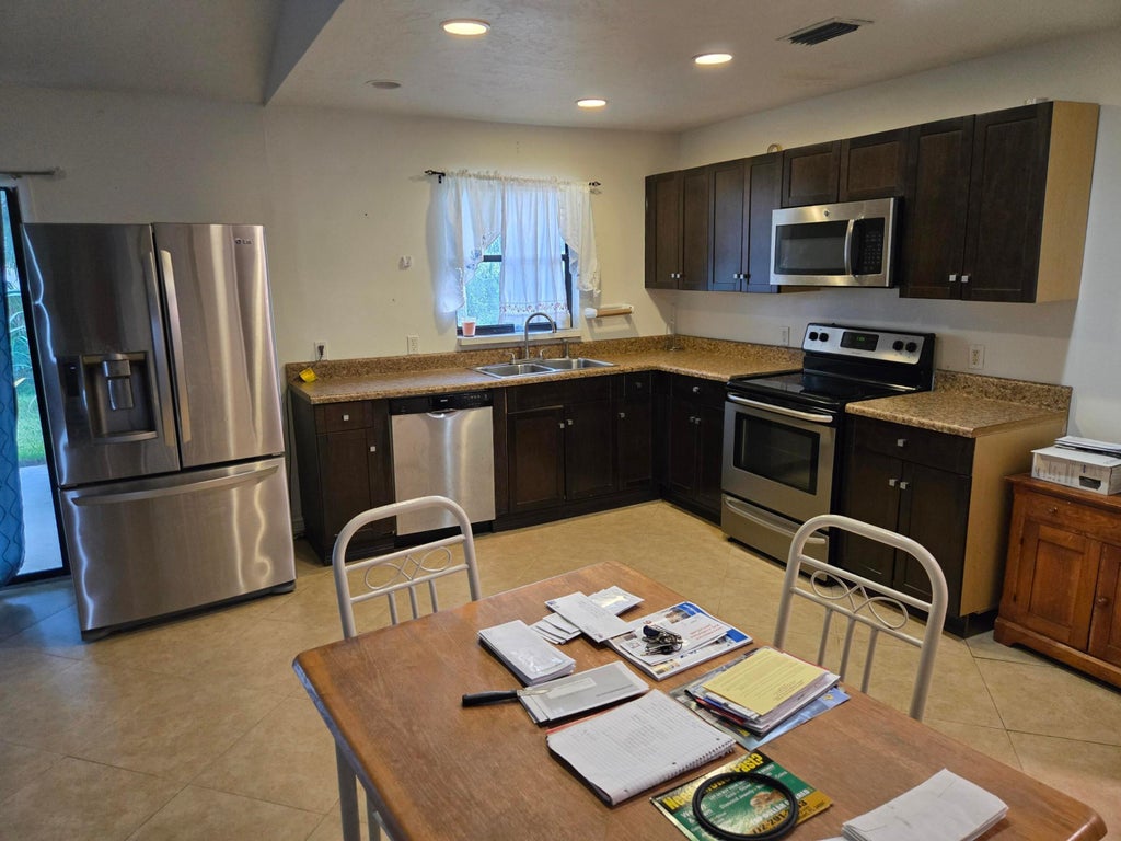 Photo of 761 NW BAYSHORE Boulevard, Port Saint Lucie, FL 34983 (MLS # B26078697)