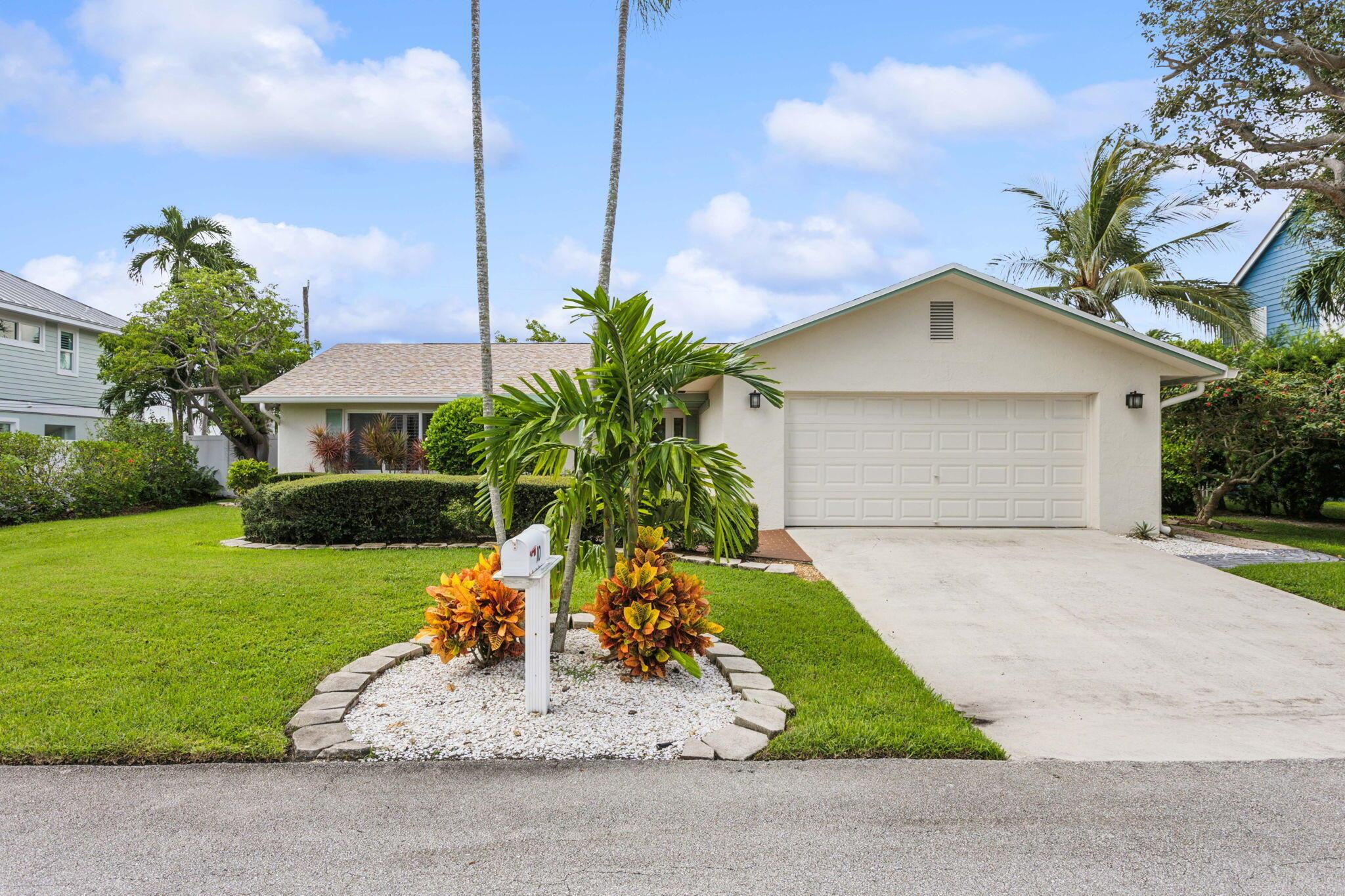 Experience coastal living in an incredible location! This one-story, two-bedroom, two-bath home is located East of A1A, with convenient beach access! Available seasonally or annually, this charming home features a spacious split-bedroom layout, hurricane impact windows and doors, two-car garage, and a large open patio perfect for outdoor living. Tastefully updated, this fully furnished home includes internet and the owner may consider a pet. Enjoy a private, fenced yard in a quiet, walkable neighborhood ideal for biking and beachside strolls. Come see this beach side retreat today!