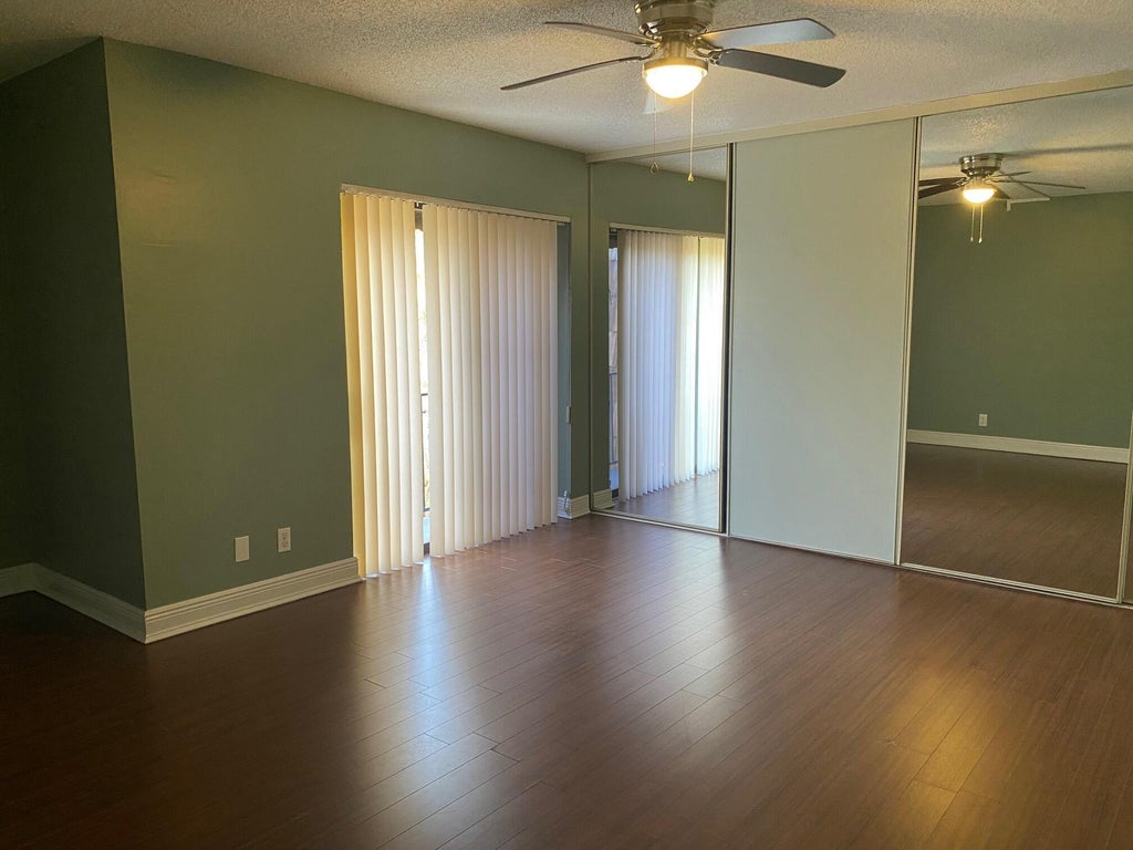 Photo of 1705 Forest Lakes Circle #C, West Palm Beach, FL 33406 (MLS # B26015407)