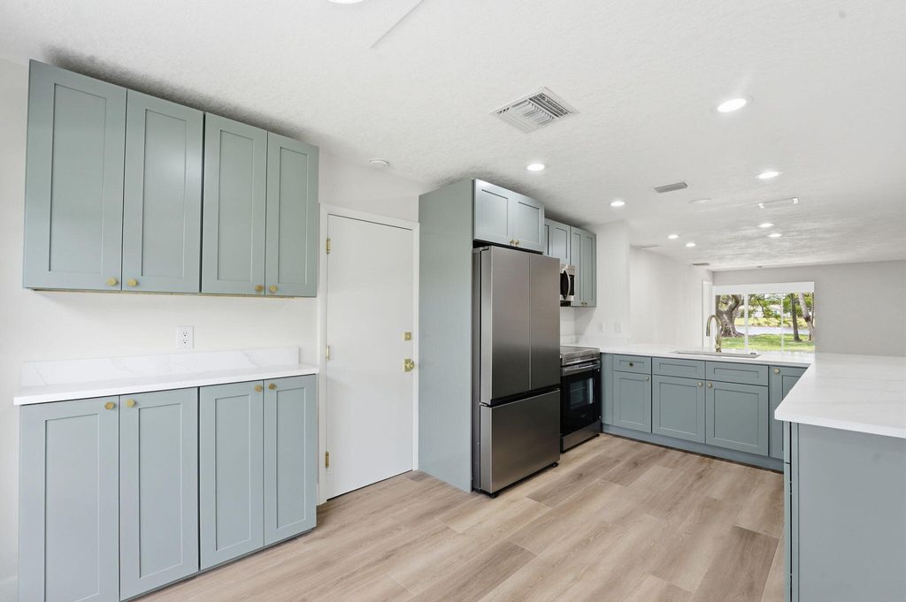 Photo of 6367 Summer Sky Lane, Greenacres, FL 33463 (MLS # B26027649)