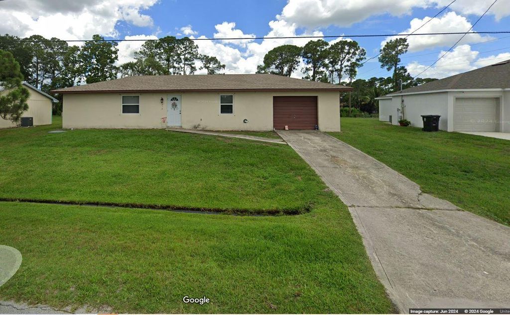 Photo of 314 SE Evergreen Terrace, Port Saint Lucie, FL 34983 (MLS # R11006325)