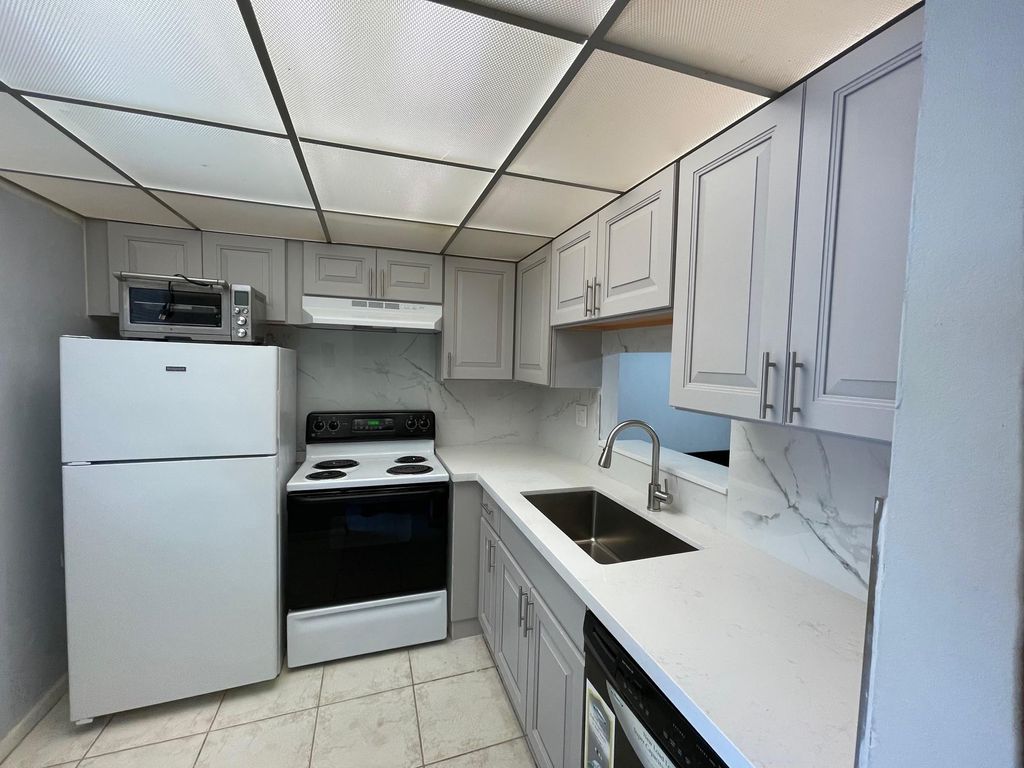 Photo of 3501 NW 47th Avenue #406, Lauderdale Lakes, FL 33319 (MLS # F10487207)