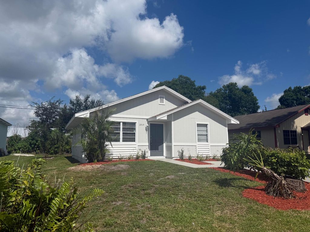 Photo of 2315 86th Drive, Vero Beach, FL 32966 (MLS # B26030213)